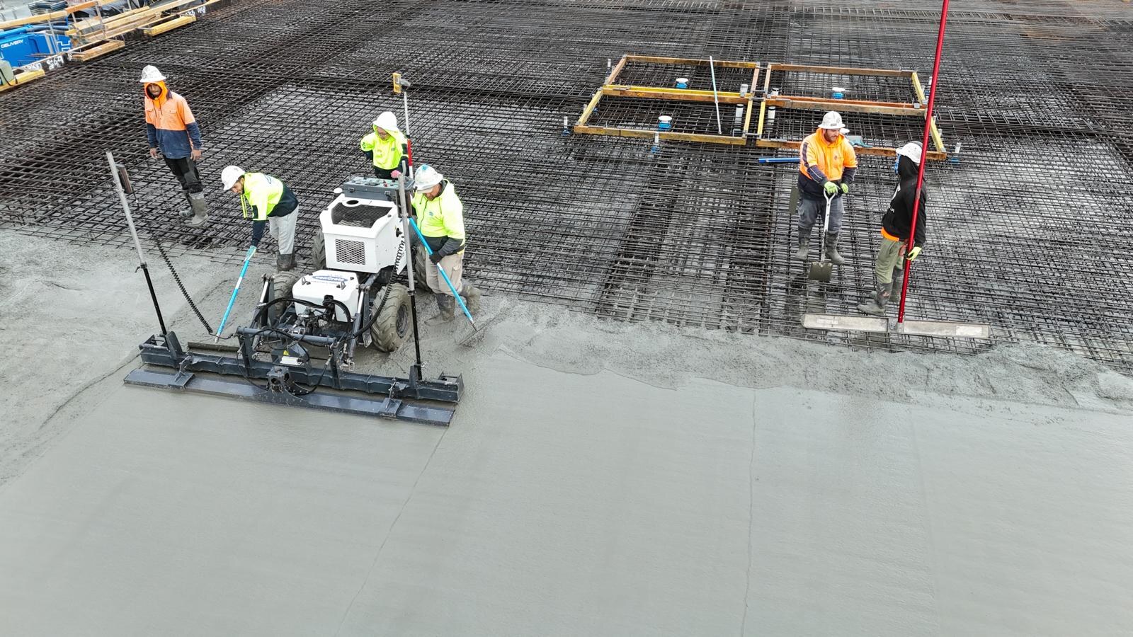 Laser screed levelling a deck pour
